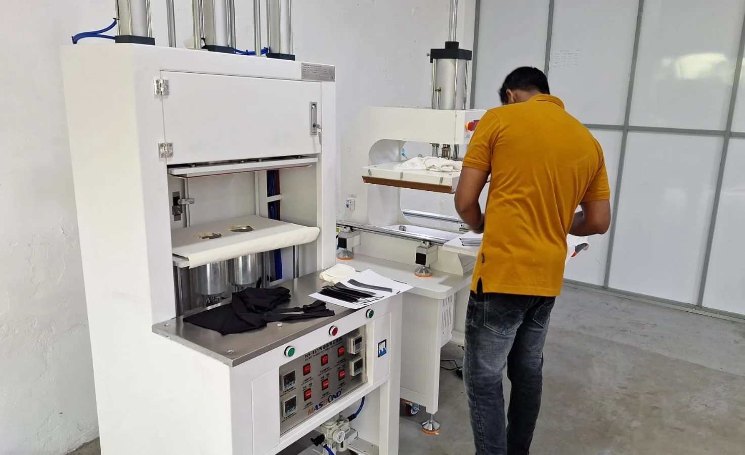 Bonding and molding machinery in operation at TechFit